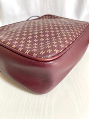 1980s. vintage Celine shoulder purse in bordeaux, burgundy leather with iconic blaison macadam print all over. riri zipper. 0411102