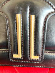 Vintage Lanvin black leather shoulder bag with iconic golden logo motif, Classic purse for daily use. 050222ya1