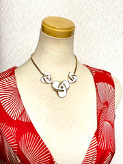 Vintage Christian Dior white flower charm necklace. Rare and one of a kind old jewelry piece. 0410051