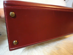 1980s Vintage HERMES Kelly 32 bag rouge ash box calf leather with gold hardware. Exterior stitch. Stamp K in O, 1981. Best known classic bag