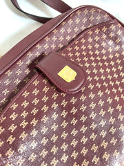 1980s. vintage Celine shoulder purse in bordeaux, burgundy leather with iconic blaison macadam print all over. riri zipper. 0411102