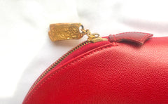 Vintage Christian Lacroix red patent enamel and leather bolide bag with golden logo zipper charm. Comes with shoulder strap. 0403172