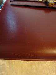 1980s Vintage HERMES Kelly 32 bag rouge ash box calf leather with gold hardware. Exterior stitch. Stamp K in O, 1981. Best known classic bag