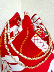 Vintage CHANEL red and white canvas large hobo shoulder bag with supermodel print and CC charm. Mademoiselle. 0407231