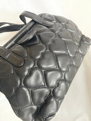 Vintage MOSCHINO black heart shape quilted lambskin mini handbag, tote purse. Too cute to carry.