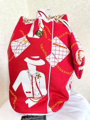 Vintage CHANEL red and white canvas large hobo shoulder bag with supermodel print and CC charm. Mademoiselle. 0407231