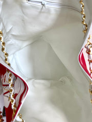 Vintage CHANEL red and white canvas large hobo shoulder bag with supermodel print and CC charm. Mademoiselle. 0407231
