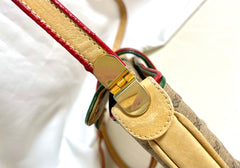 Vintage Gucci GG monogram shoulder bag with red and green webbing color convo shoulder bag. Golden and silver GG motif on the flap. 0411273