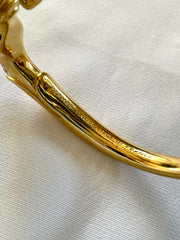 Vintage Hermes golden double horse head design bangle, bracelet. Beautiful classic jewelry from Hermes. 050120an8