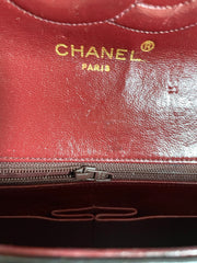 80's vintage Chanel black 2.55 shoulder bag with circle CC  flap design. Rare piece from the era. 0410283