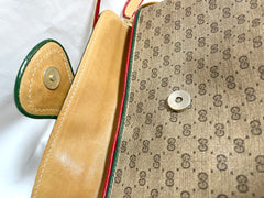 Vintage Gucci GG monogram shoulder bag with red and green webbing color convo shoulder bag. Golden and silver GG motif on the flap. 0411273