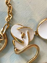 Vintage Christian Dior white flower charm necklace. Rare and one of a kind old jewelry piece. 0410051