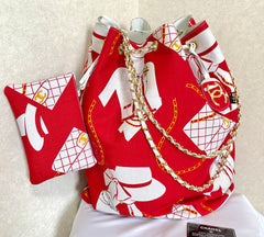 Vintage CHANEL red and white canvas large hobo shoulder bag with supermodel print and CC charm. Mademoiselle. 0407231