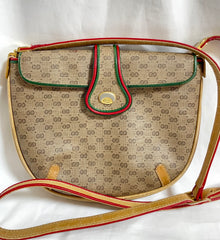 Vintage Gucci GG monogram shoulder bag with red and green webbing color convo shoulder bag. Golden and silver GG motif on the flap. 0411273