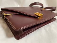 Vintage Cartier double flap envelope shoulder bag with gold-tone logo charm closure and frames. Classic purse from Must de Cartier. 0408172
