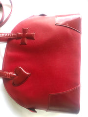 Vintage Christian Lacroix red patent enamel and leather bolide bag with golden logo zipper charm. Comes with shoulder strap. 0403172