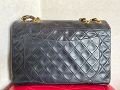 Vintage CHANEL black lamb leather large, jumbo size shoulder bag with big golden CC closure and chain strap. 2.55 classic purse. 050223rc1