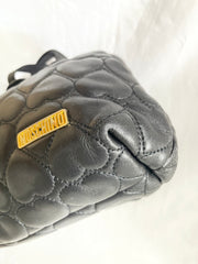 Vintage MOSCHINO black heart shape quilted lambskin mini handbag, tote purse. Too cute to carry.