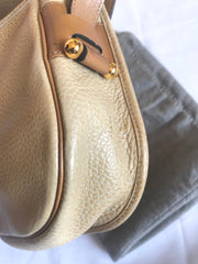 Vintage Christian Dior nude beige leather purse, shoulder bag with golden Dior motif. Classic purse. 0506286