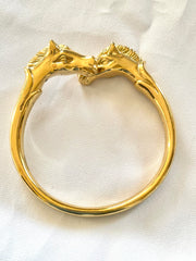 Vintage Hermes golden double horse head design bangle, bracelet. Beautiful classic jewelry from Hermes. 050120an8