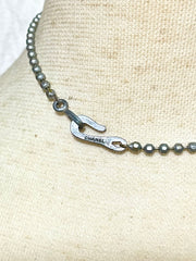 Vintage CHANEL silver matelasse camellia, rose flower charm necklace. Classic Chanel jewelry for your collection. So chic and mod. 0410031