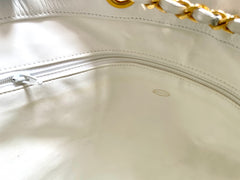 Vintage CHANEL red and white canvas large hobo shoulder bag with supermodel print and CC charm. Mademoiselle. 0407231