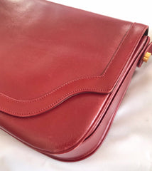 Vintage Lanvin wine leather shoulder bag with golden logo motif closure. Classic must have purse. 060620r2