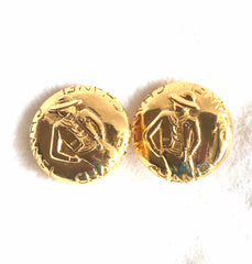 Vintage CHANEL gold tone round earrings with mademoiselle figure. Classic vintage Chanel jewelry. 0406011