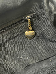 Vintage MOSCHINO black heart shape quilted lambskin mini handbag, tote purse. Too cute to carry.