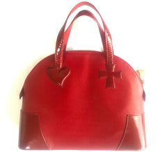 Vintage Christian Lacroix red patent enamel and leather bolide bag with golden logo zipper charm. Comes with shoulder strap. 0403172