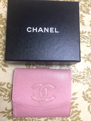 Vintage CHANEL milky pink caviar leather wallet with stitched CC mark. Classic.
