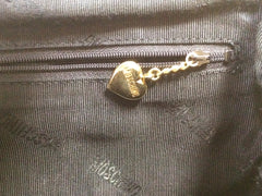 Vintage MOSCHINO black heart shape quilted lambskin mini handbag, tote purse. Too cute to carry.