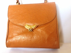 MINT. Vintage Nina Ricci tan brown ostrich-embossed leather handbag purse with golden motif at closure. Masterpiece by Maroquinerie