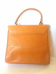 MINT. Vintage Nina Ricci tan brown ostrich-embossed leather handbag purse with golden motif at closure. Masterpiece by Maroquinerie