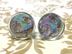Vintage CHANEL silver tone and rainbow aurora shining earrings with Chanel iconic charms. Shoe, camellia, and CC mark in it. Perfect.