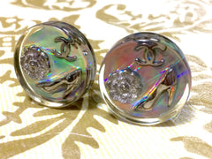Vintage CHANEL silver tone and rainbow aurora shining earrings with Chanel iconic charms. Shoe, camellia, and CC mark in it. Perfect.