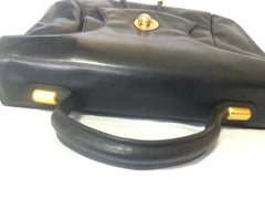 Vintage Bally black leather retro pop design bag, business purse with gold tone drawstrings and unique flap cut design.  Unisex use. 160315