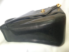 Vintage Bally black leather retro pop design bag, business purse with gold tone drawstrings and unique flap cut design.  Unisex use. 160315