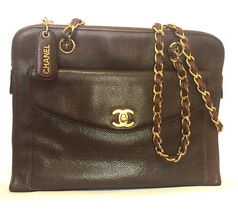 Vintage CHANEL dark brown caviarskin chain shoulder tote bag with golden CC closure. Classic and daily use bag