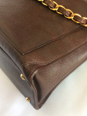 Vintage CHANEL dark brown caviarskin chain shoulder tote bag with golden CC closure. Classic and daily use bag