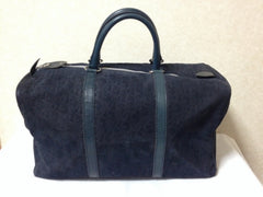 80's vintage Christian Dior Bagages navy genuine suede leather travel duffle bag, purse, handbag with embossed Dior logo allover. Unisex
