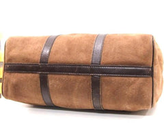 80's vintage Christian Dior Bagages genuine brown suede leather travel duffle bag, purse with embossed Dior logo allover. Unisex luggage