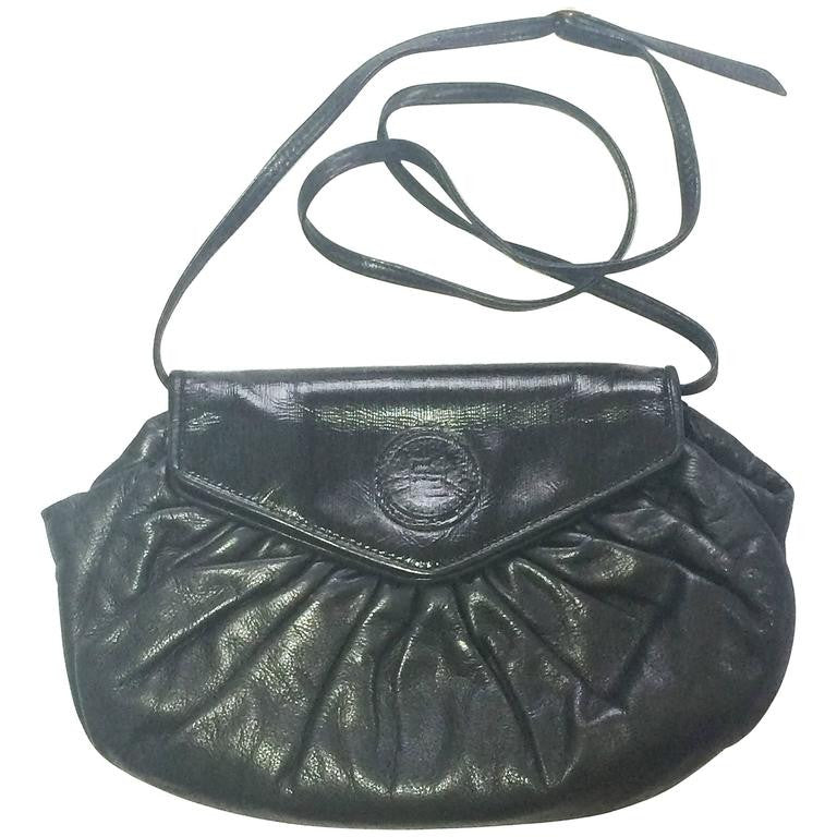 70's, 80's vintage FENDI black nappa leather oval round shape shoulder purse. Can be a clutch bag as well.