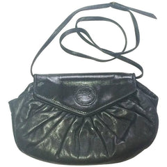 70's, 80's vintage FENDI black nappa leather oval round shape shoulder purse. Can be a clutch bag as well.