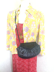 70's, 80's vintage FENDI black nappa leather oval round shape shoulder purse. Can be a clutch bag as well.