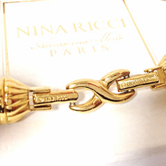 MINT. Vintage Nina Ricci golden chain statement necklace with ribbon bow and crystal stone heart pendant top. Perfect vintage jewelry