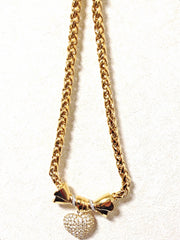 MINT. Vintage Nina Ricci golden chain statement necklace with ribbon bow and crystal stone heart pendant top. Perfect vintage jewelry