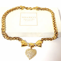 MINT. Vintage Nina Ricci golden chain statement necklace with ribbon bow and crystal stone heart pendant top. Perfect vintage jewelry