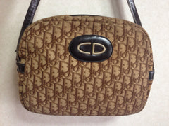 70's vintage Christian Dior brown trotter jacquard handbag with the gold tone large CD motif. ECLAIR zippers. Unisex