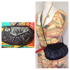 70's, 80's vintage FENDI black nappa leather oval round shape shoulder purse. Can be a clutch bag as well.